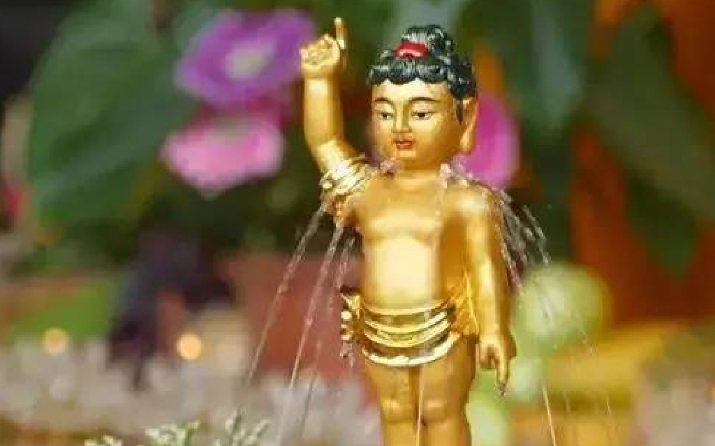 佛诞清凉法，浴佛普度光